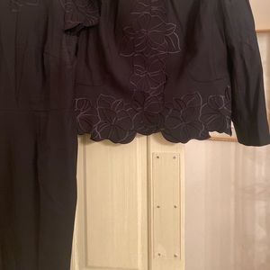 One of my favorites size 12 black  dress and black jacket